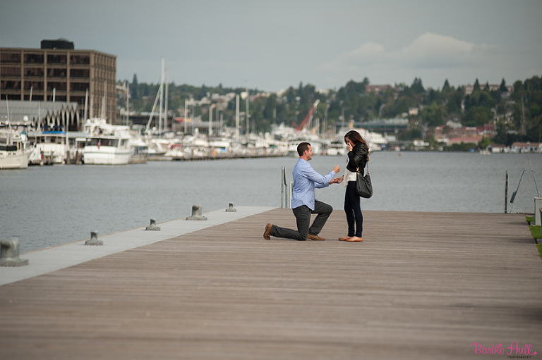 couple getting engaged in South Lake Union