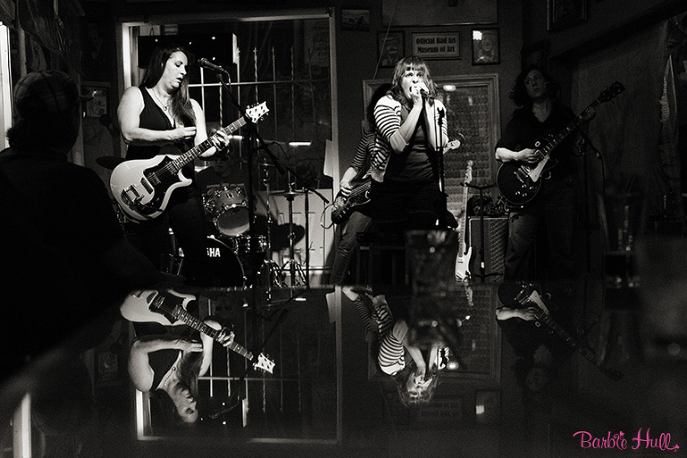 black and white photo of band at Cafe Racer