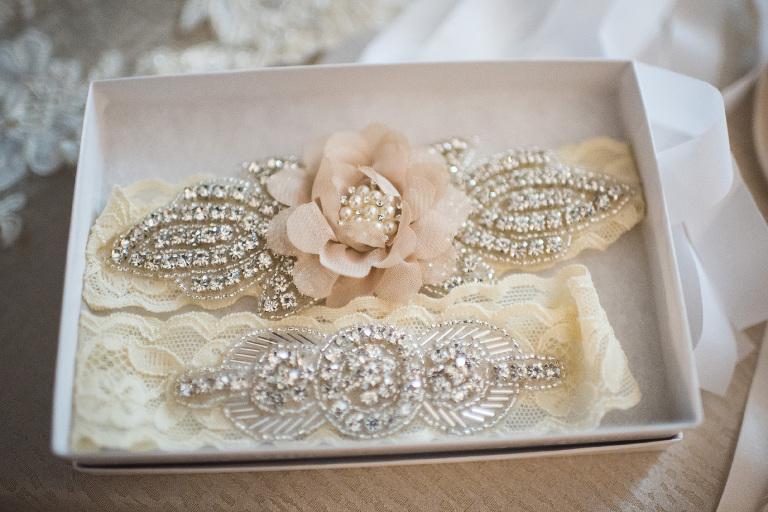 Something borrowed, her best friends garter signifies borrowed happiness for all of their years