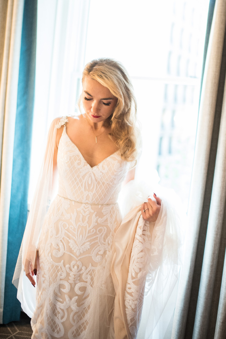 Beautiful bride in her perfectly made for her wedding gown from Dress Theory!