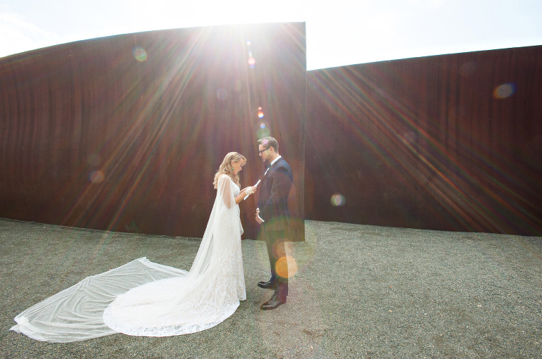 The sun rained down on these two as they shared their private vows before the ceremony! SO SWEET!