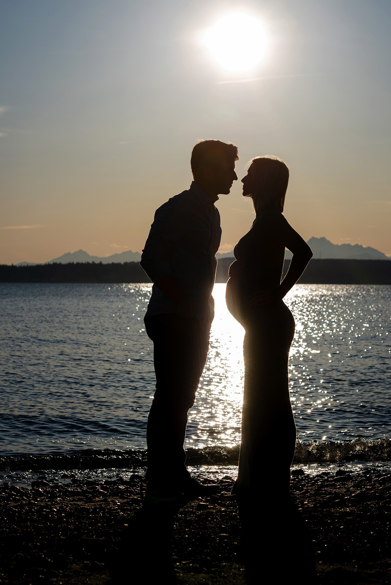 Silhouetted couple on the Washington coast.